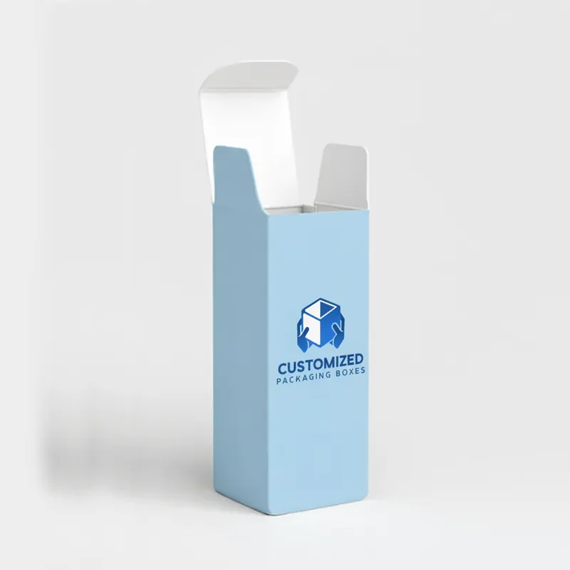 A small, white cardboard box, likely for a 30ml bottle, with simple minimalist design.
